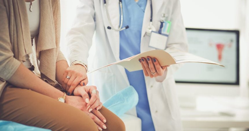 Woman at doctor.