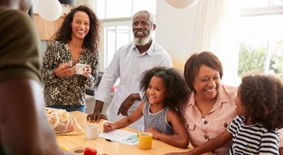 multi-generational family eating breakfast